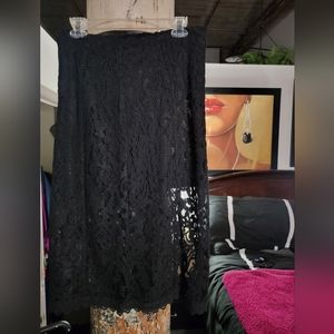 FP Blk Lace Midi Skirt has a lining only from the waist to the thigh